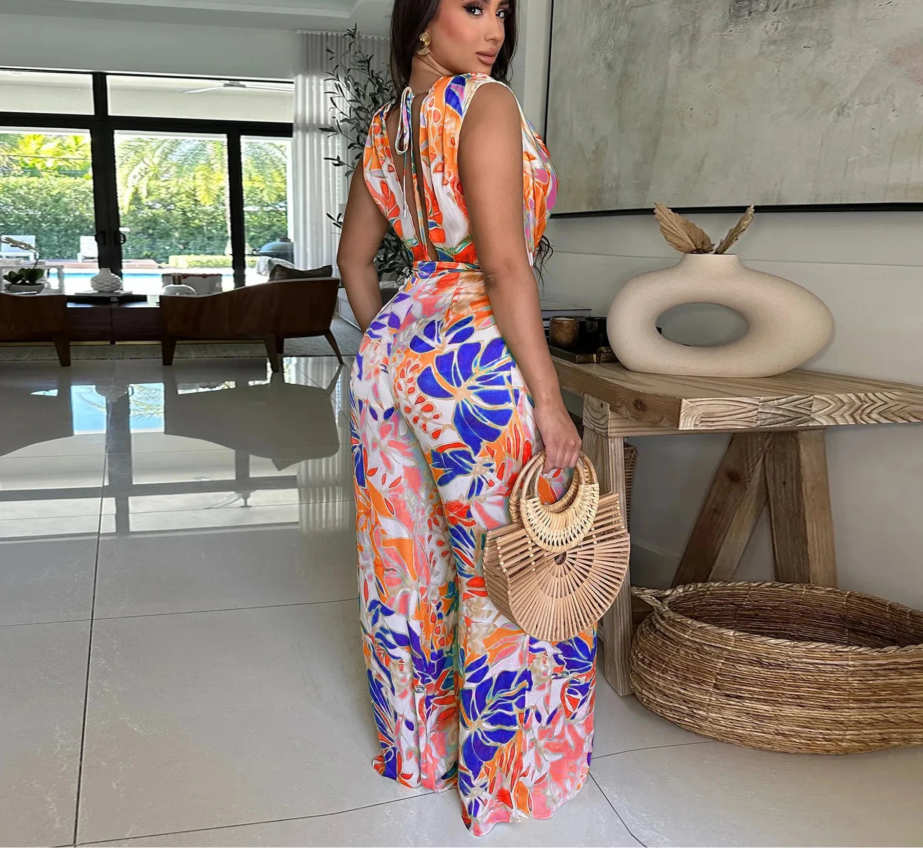 Women’s Leaf Printed Wide Leg Pile Neck Sleeveless Satin Jumpsuit